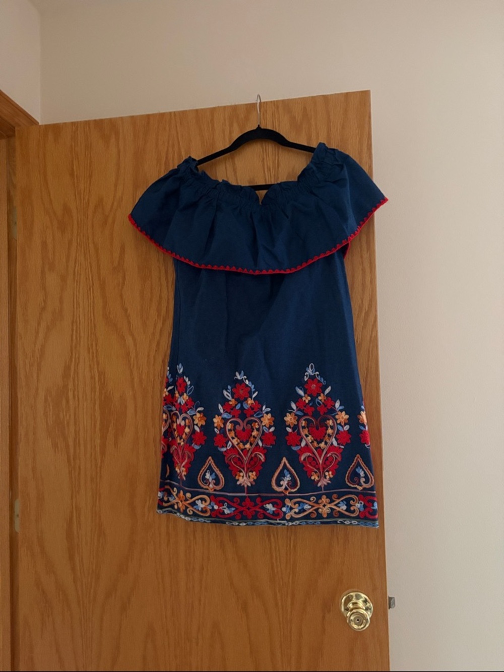 Free the Roses Navy Off-Shoulder dress with Red Trim!